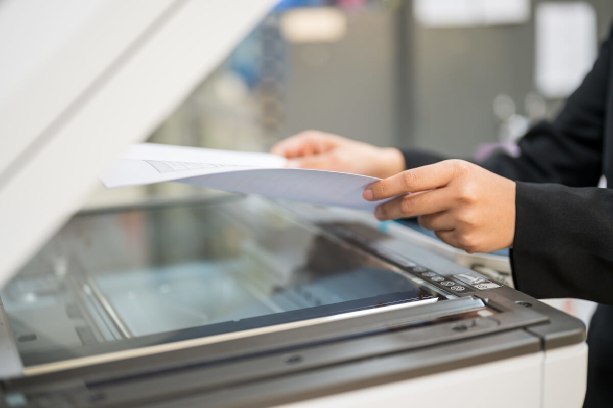Person printing in an office