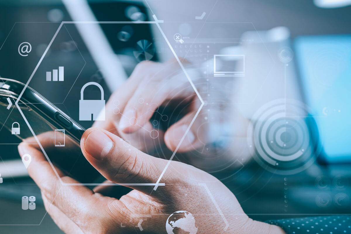 Man using mobile phone with security icons floating around